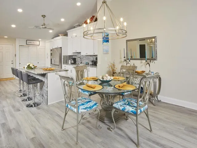 Dining area with bright lighting, beautiful chandelier
