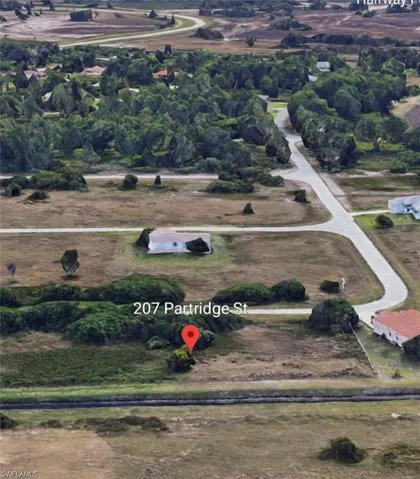 Aerial view of property's location with rural landscape