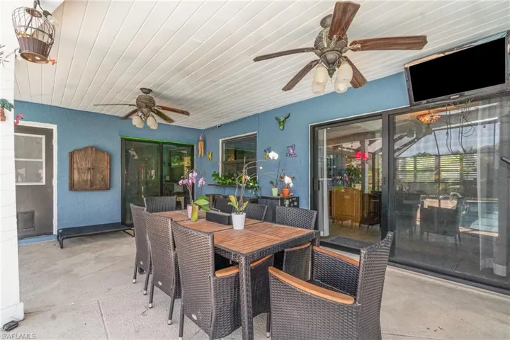 View of patio / terrace featuring outdoor dining space and ceiling fan