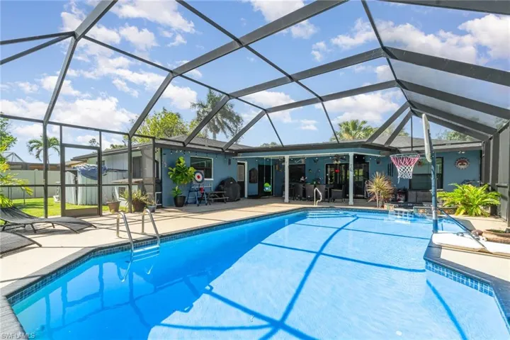 Outdoor pool featuring a patio and a lanai