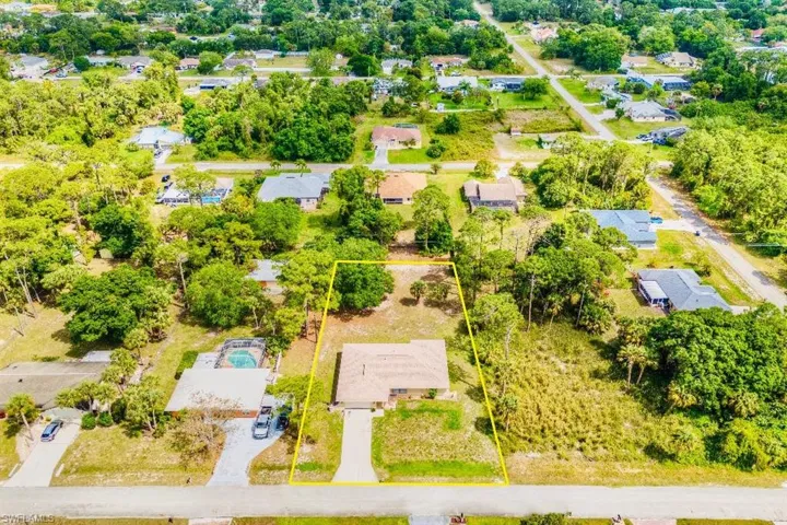 104  Edward  AVE, Lehigh Acres, FL 33936