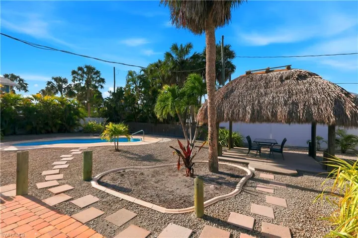 Fenced backyard featuring a patio area