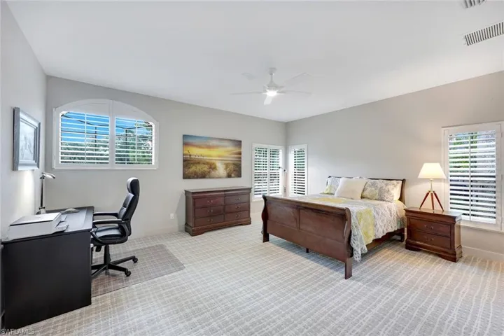 Third guest bedroom is privately tucked away from the rest of the home.