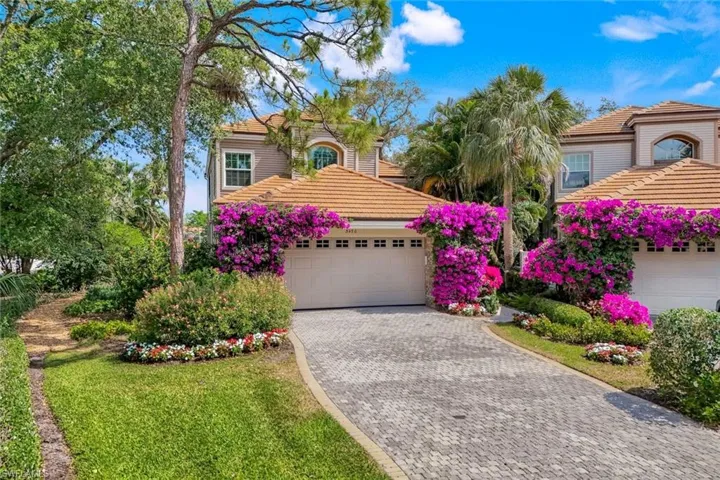 Adorned with lush landscaping, THIS will be your winter oasis.
