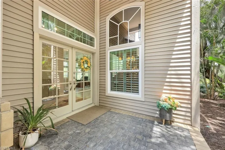 Entryway is privately tucked away on the Eastern side of the home.