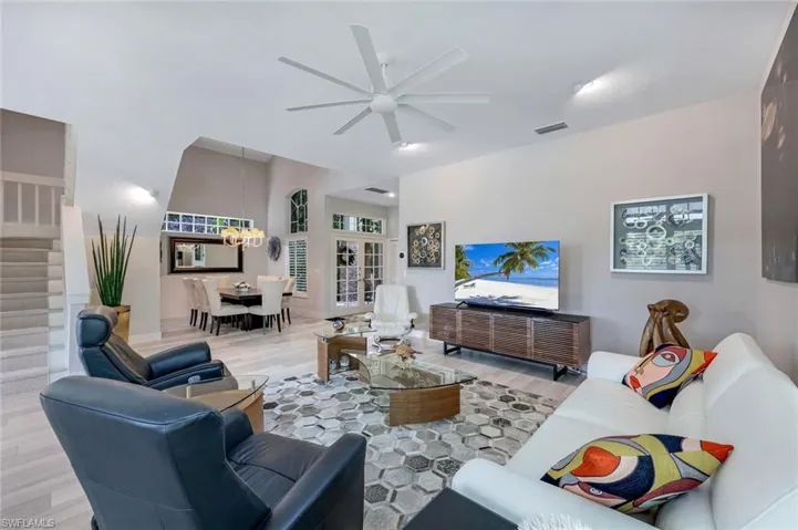 Living room and dining room are open to one another.