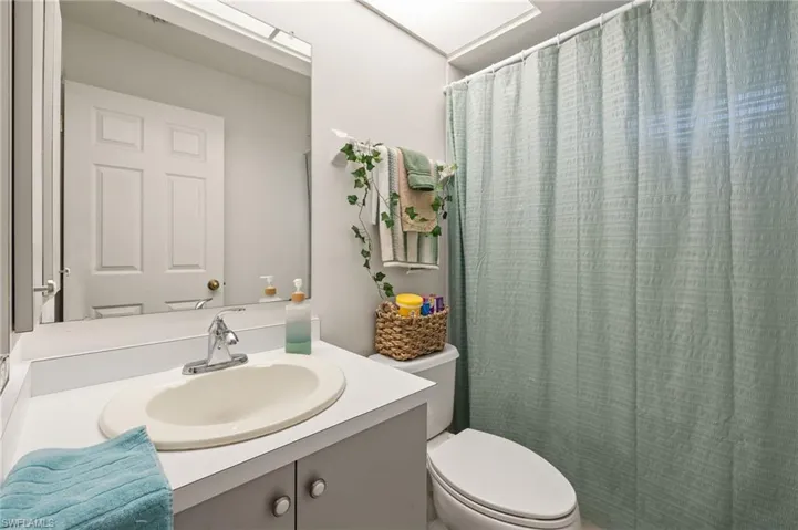 2nd Bathroom featuring toilet and vanity
