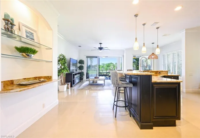 Entry to the kitchen area with flexible space on the left