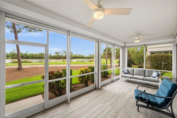 Sunroom featuring a water view, ceiling fan, and an outdoor hangout area