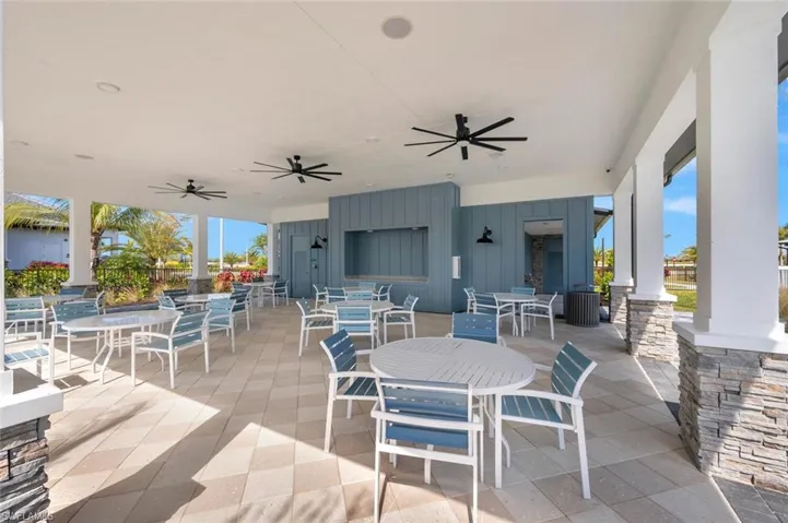 View of patio featuring ceiling fan