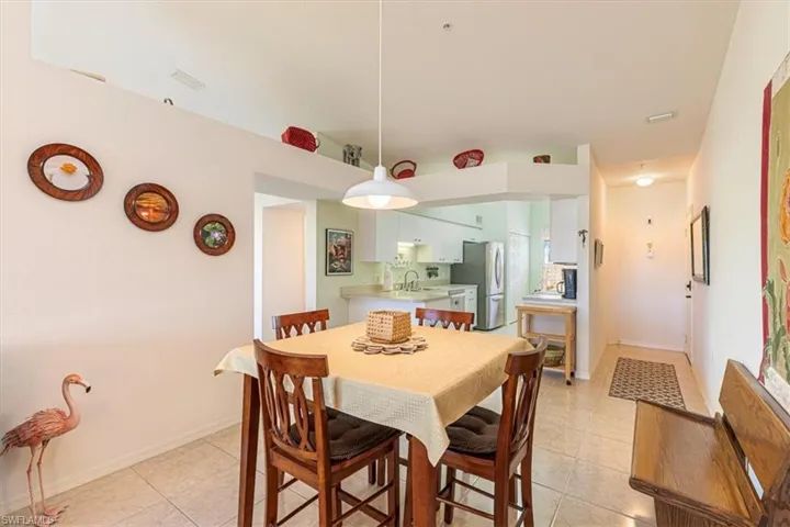 Dining room featuring light tile patterned flooring