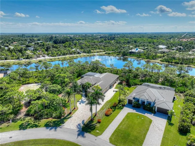 Aerial perspective of home and lake