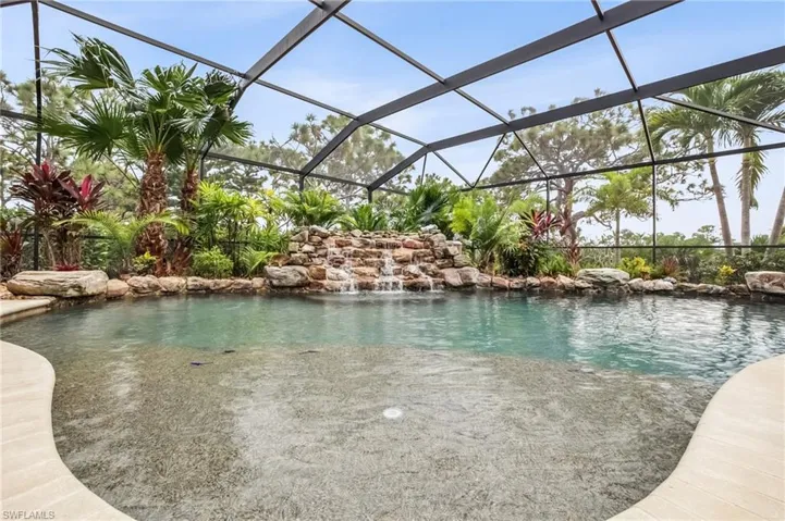 Outdoor pool with waterfall