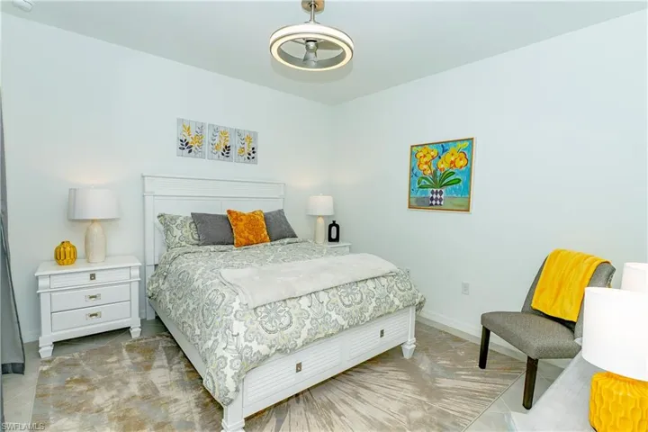 Tiled bedroom with baseboards