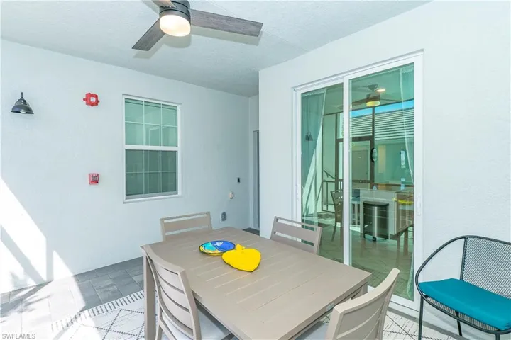 View of patio with ceiling fan