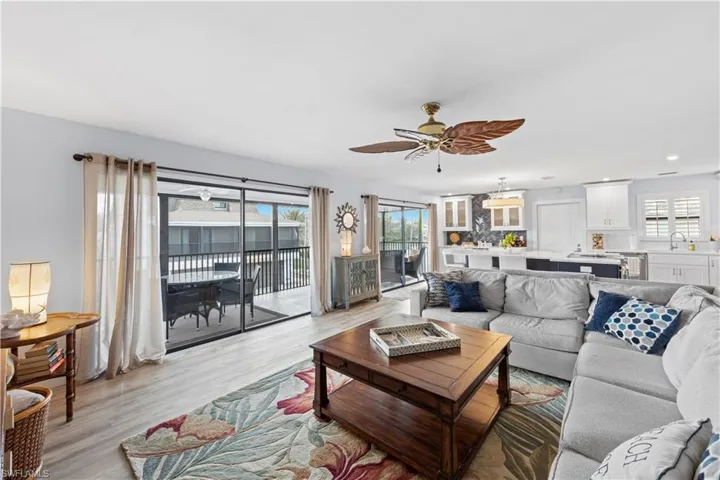 Living area featuring plenty of natural light from its eastern exposure and sunrises over the bay