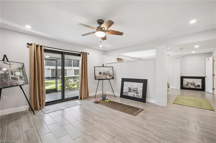 Bonus room showing ideas of unlimited use with access to the lower-level screened patio which leads to your very own deeded dock and boat slip or community pool