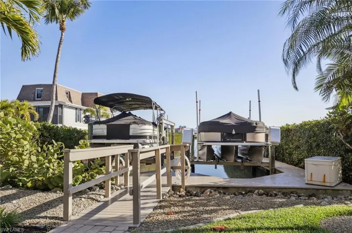View from center of Palm Bay's 8-unit community with the perspective of looking through some of the other owner's docks