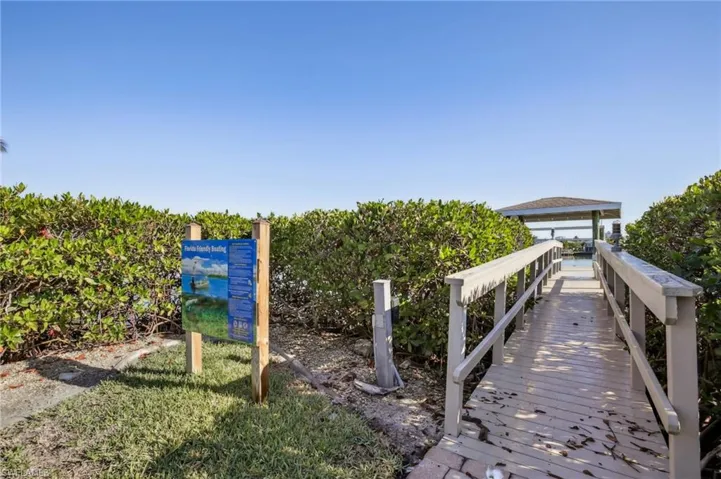 Boardwalk to deeded dock. Fish cleaning station located on private dock for convenience before heading in with your fresh catch