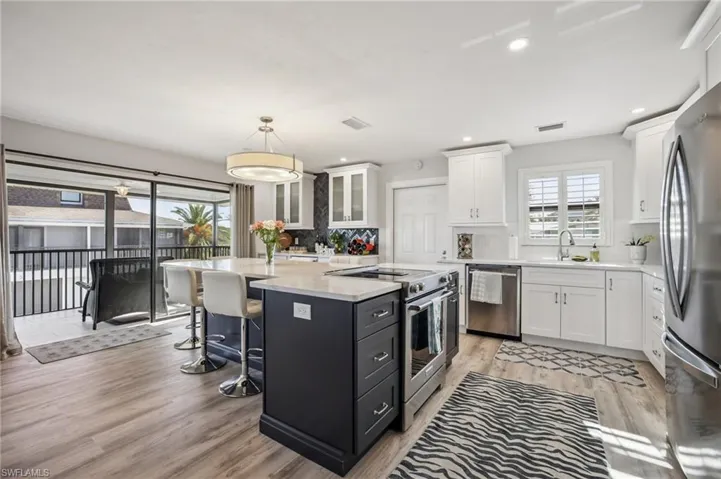 Newly remodeled kitchen, great for entertaining as well as preparing meals while looking out to the tranquil bay and feeling the cool breeze off of the water