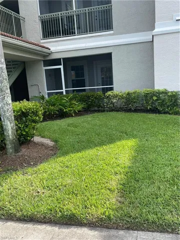 Ground-level patio with screening and direct lawn access