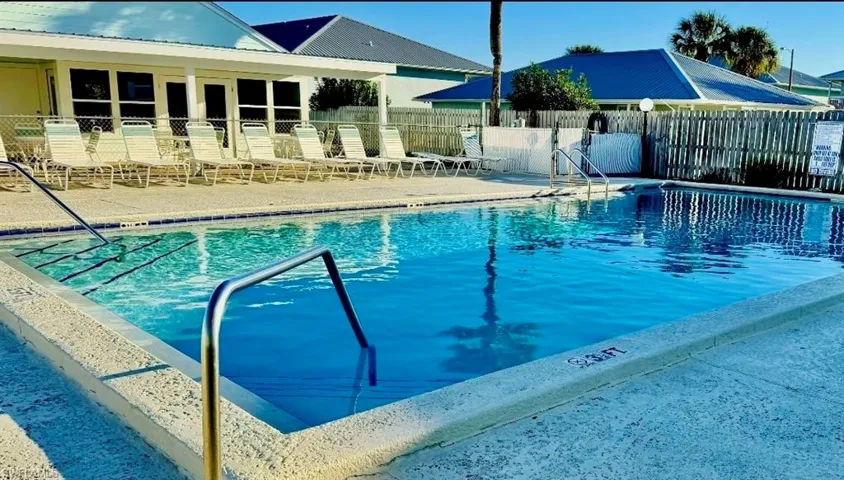 Community pool featuring a patio area