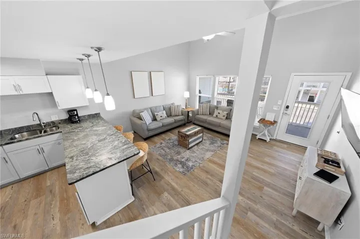Living area with light wood-style floors