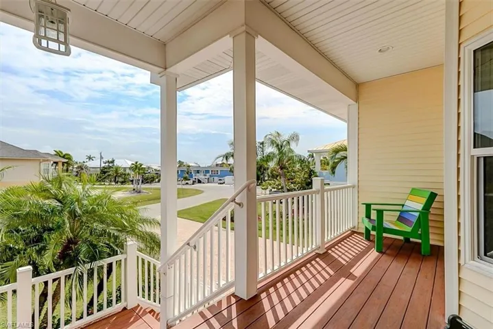 FLORIDA-STYLE OPEN FRONT PORCH.  COMPOSITE DECKING.