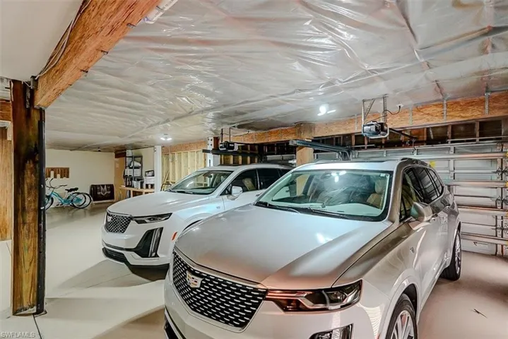 2-CAR GARAGE WITH WIND-RATED DOORS AND AUTOMATIC GARAGE DOOR OPENER