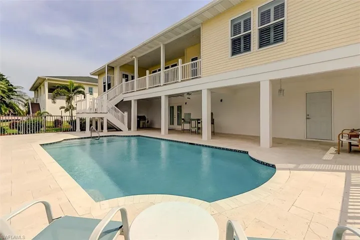 WESTERN EXPOSURE FENCED POOL.  NEW POOL ALARM.  UPPER AND LOWER COVERED DECKS.