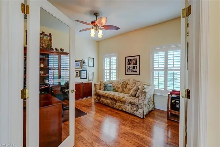 DEN/FLEX SPACE.  FRENCH DOORS.  EASTERN EXPOSURE WINDOWS.  WOOD-LOOK MANUFACTURED FLOORING.  HIGH CEILINGS.