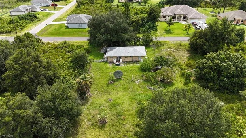 1421  Pine  AVE, Lehigh Acres, FL 33972