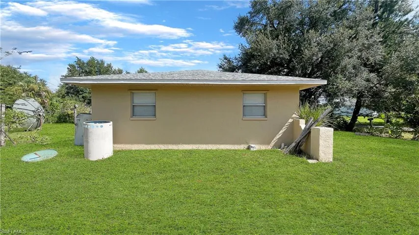 1421  Pine  AVE, Lehigh Acres, FL 33972