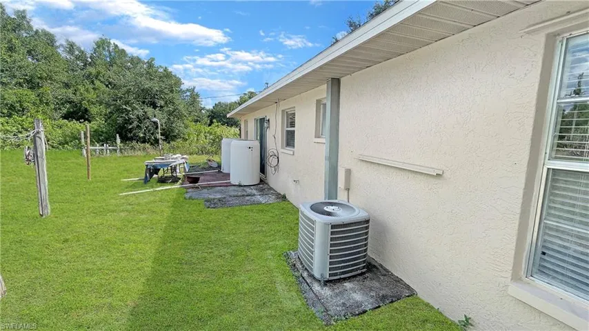 1421  Pine  AVE, Lehigh Acres, FL 33972