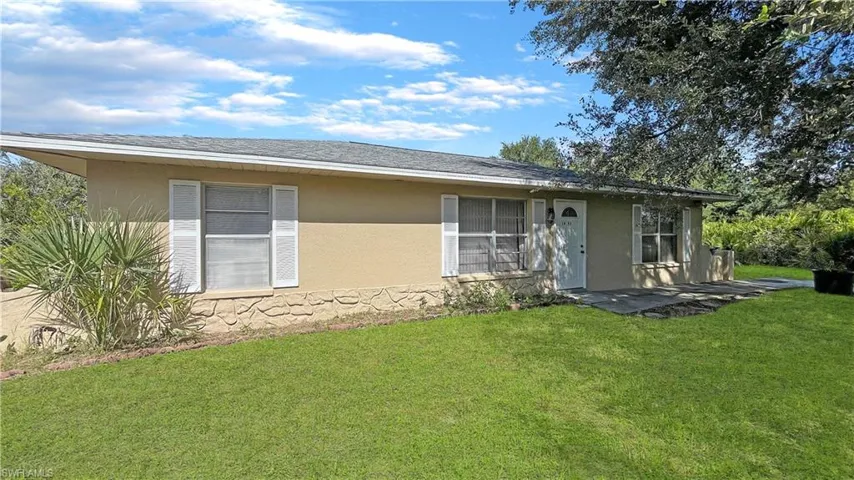 1421  Pine  AVE, Lehigh Acres, FL 33972