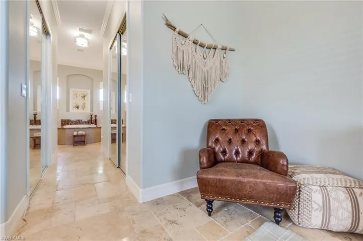 Sitting room featuring ornamental molding