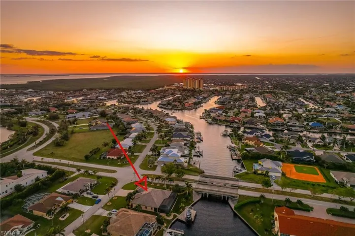 Aerial view at dusk with a water view