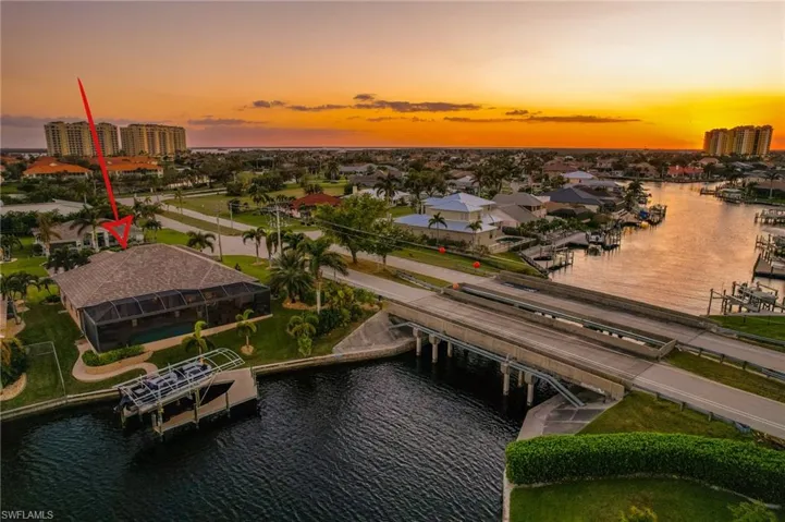 Aerial view at dusk with a water view