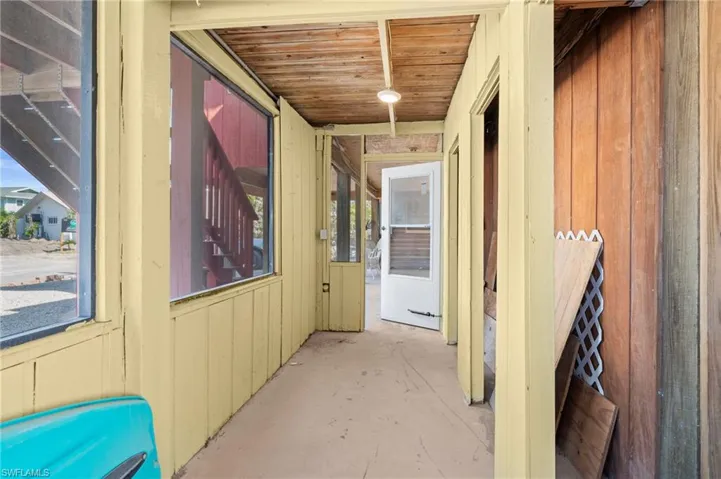 Screened-in storage or utility area  - Virtually Edited Image