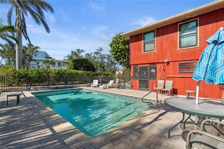Plenty of room to Relax-View of pool and a patio  - Virtually Edited Exterior Image
