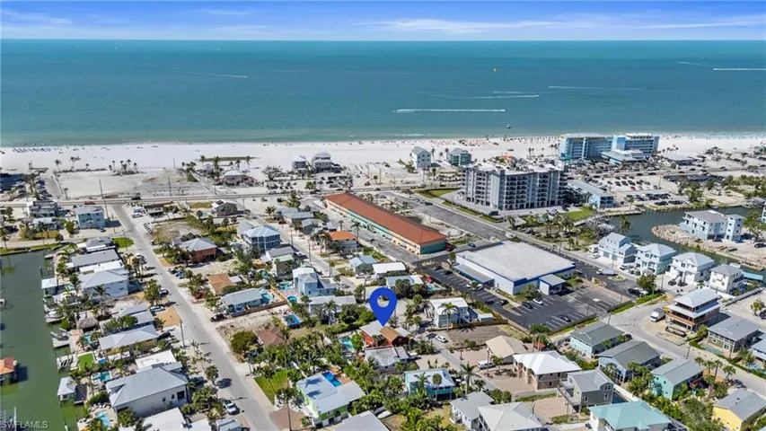 Drone / aerial view with a view of the beach - Virtually Edited Exterior Image