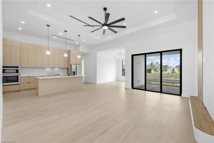 Bedroom with wood finish floors and a ceiling fan