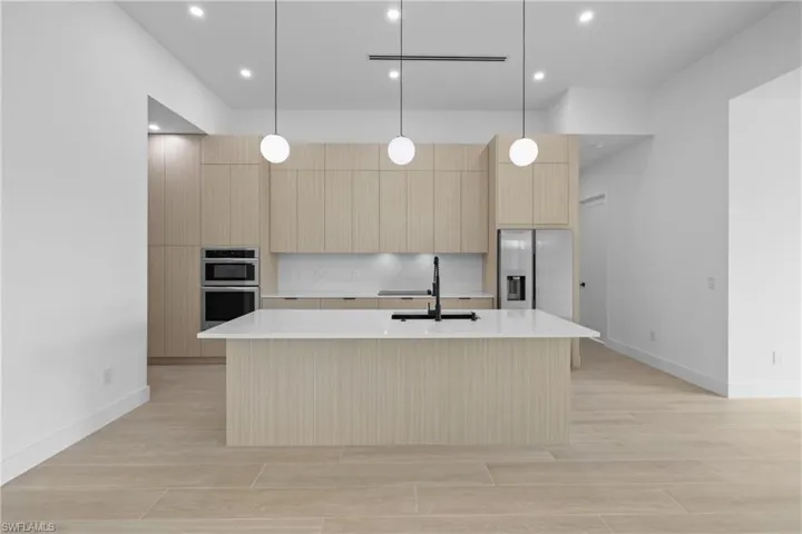 Unfurnished room with light wood-type flooring, recessed lighting, and a ceiling fan