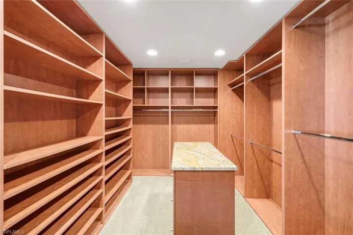 Incredible Primary Closet Build-out with Dresser Island