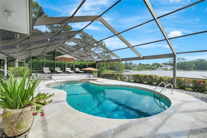 EXPANSIVE LAKEFRONT POOL DECK WITH SPA