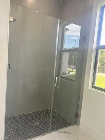 Bathroom featuring an enclosed shower