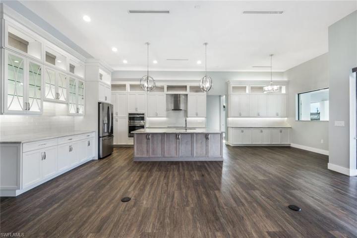 Custom Kitchen with Multiple Decorative Glass front Displays