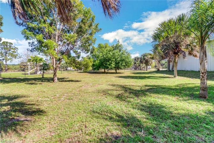 Cleared fenced in side yard for your pets to roam free