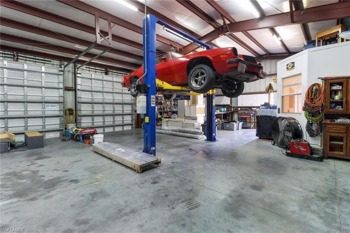 two 10x10 doors, a 12x12' door, a 9,000 LB car lift