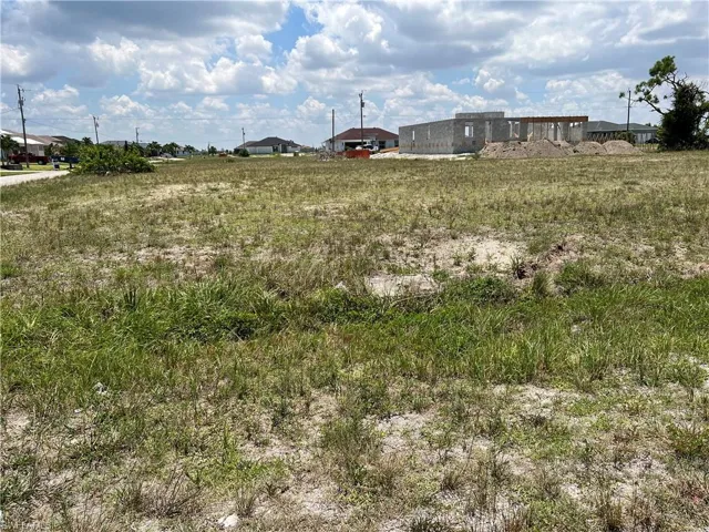 View looking east of lot.  Flat, no clearing needed!